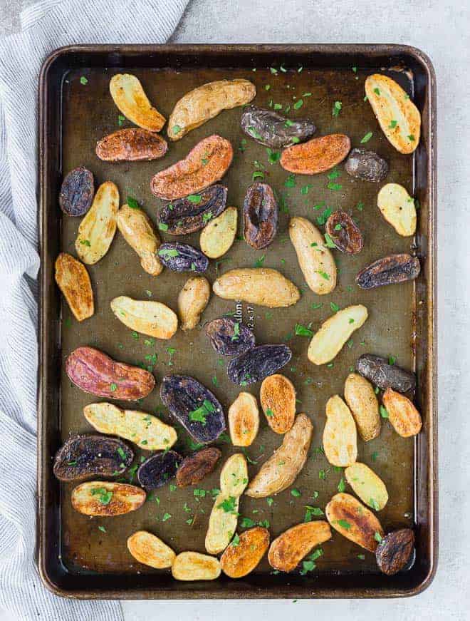 These fun and colorful roasted fingerling potatoes will impress friends and family but taste great any day of the week. And they're so easy to make!