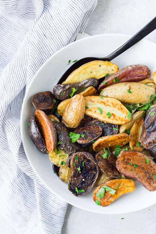 These fun and colorful fingerling potatoes will impress friends and family but taste great any day of the week. And they're so easy to make!