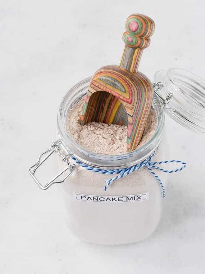 Image of dry pancake mix with a scoop inside jar.