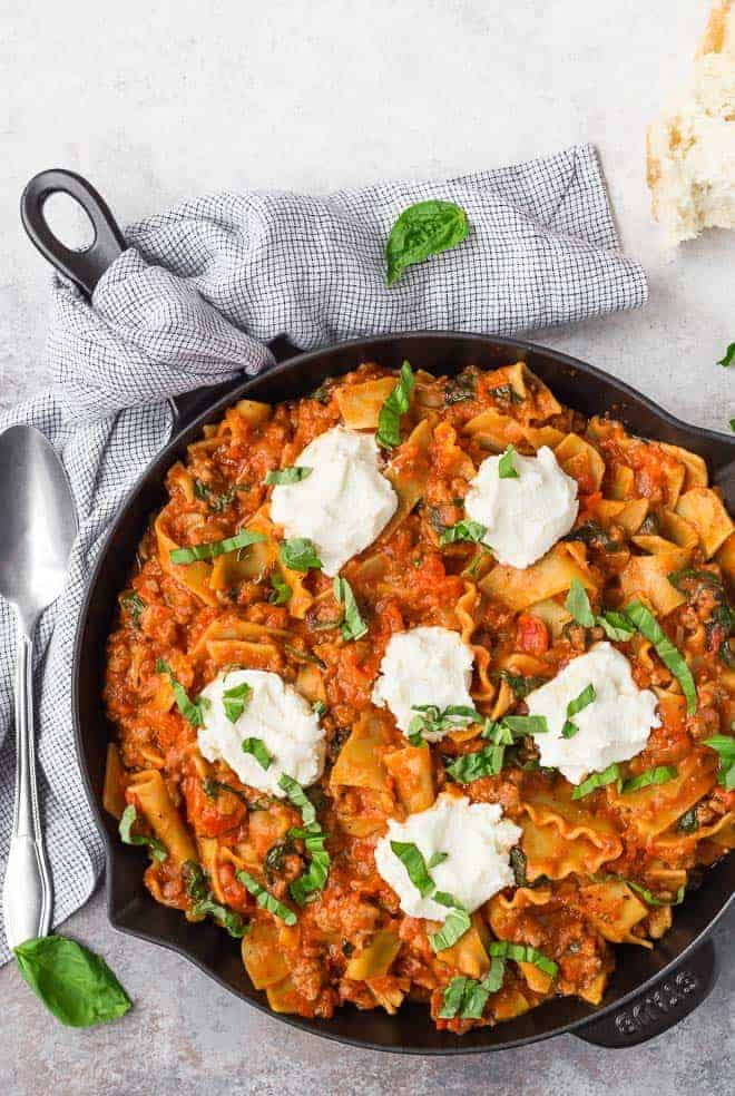 Love lasagna but hate fussing with layering everything up? This easy skillet lasagna is going to make your life way easier. It's just as delicious, but with a fraction of the work. 