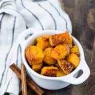 Image of spicy sweet butternut squash in a small white bowl.