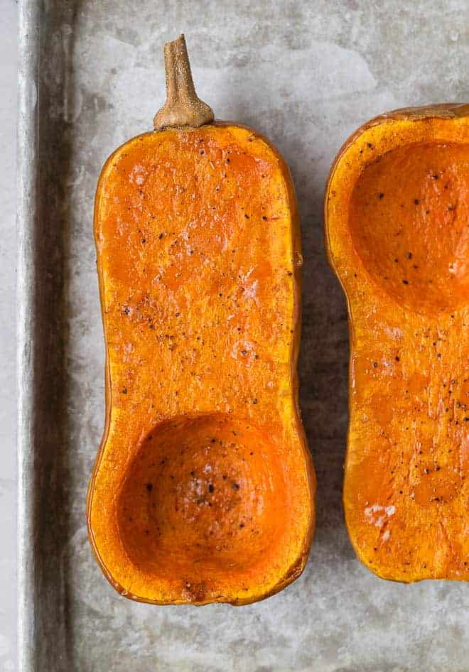 Image of two roasted butternut squash halves.