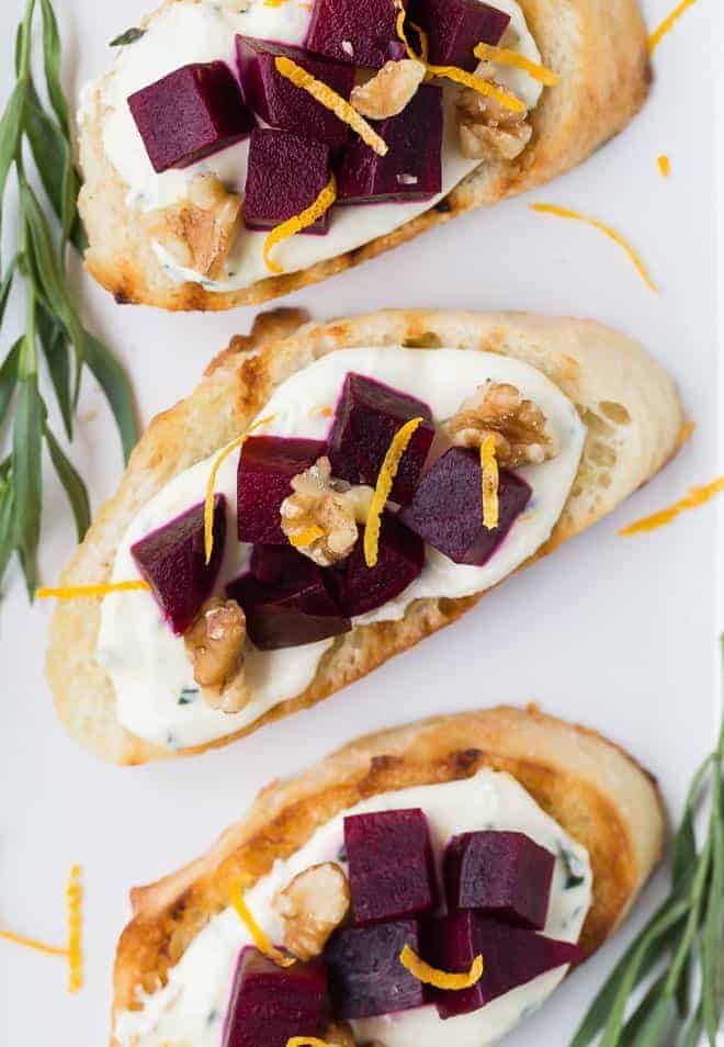 overhead photograph of beets and goat cheese on crostini