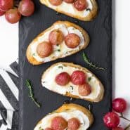 This roasted grape crostini features sweet roasted grapes bursting with juice and nestled into creamy ricotta cheese on crispy crostini. Simple, but so delicious!