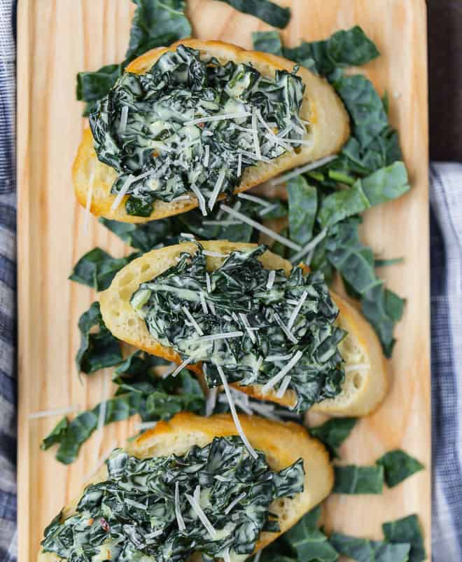 Reminiscent of spinach dip, creamy kale bruschetta will knock your socks off. Crisp bread topped with warm, creamy sautéed kale, enhanced by a hint of garlic and nutmeg, make this appetizer irresistible. 