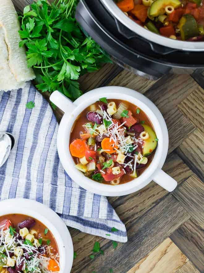 Image of vegetarian minestrone soup with carrots, zucchini, celery, kidney beans, pasta and more!