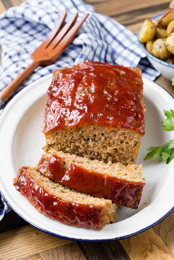 Image of classic meatloaf on a white plate.
