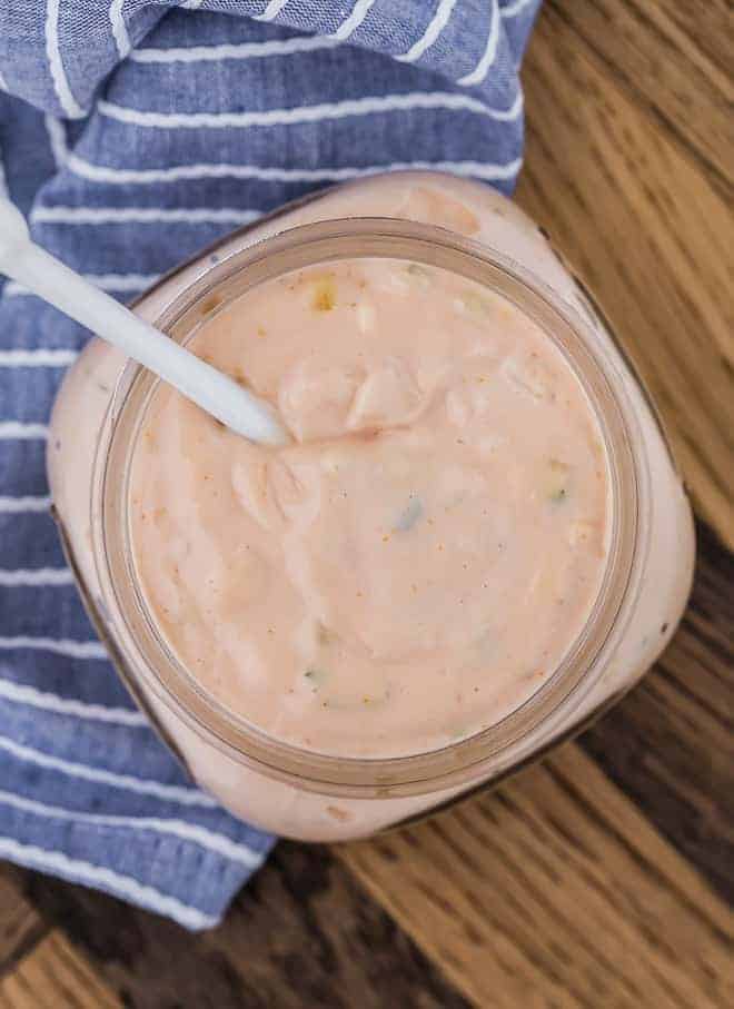 Overhead image of a jar of thousand island dressing, made from scratch.