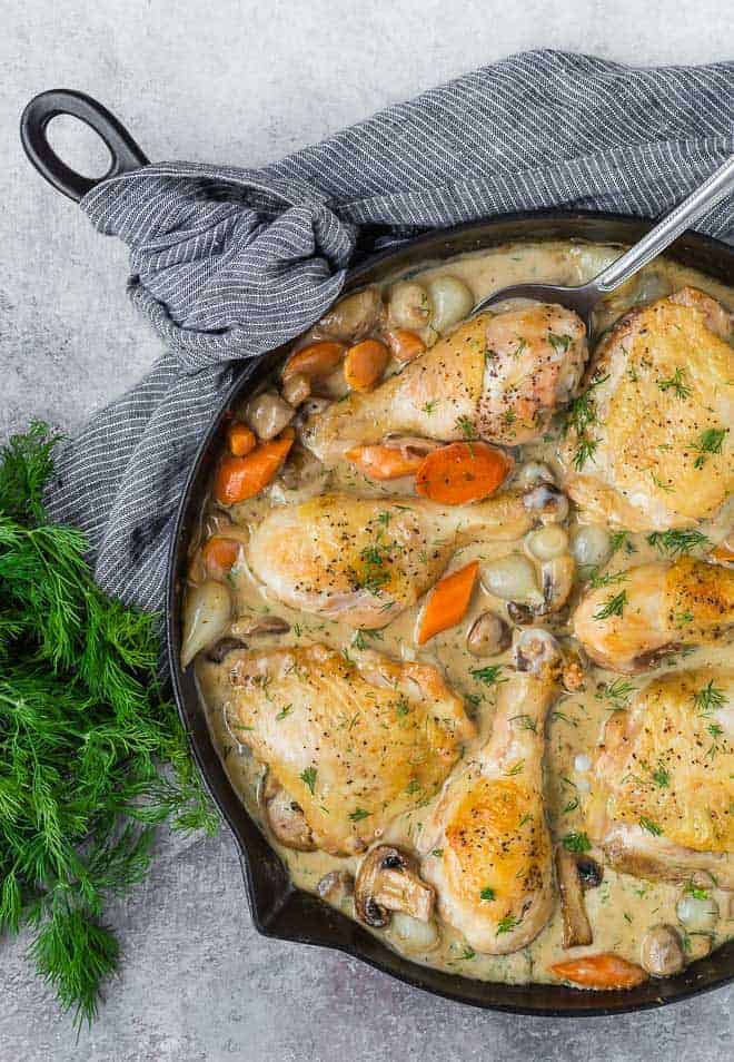 Overhead image of one pan chicken fricassee in the skillet it was prepared in.