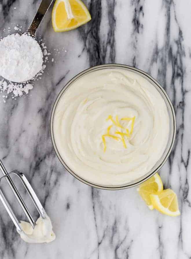 Overhead image of cream cheese frosting flavored with fresh lemon. 