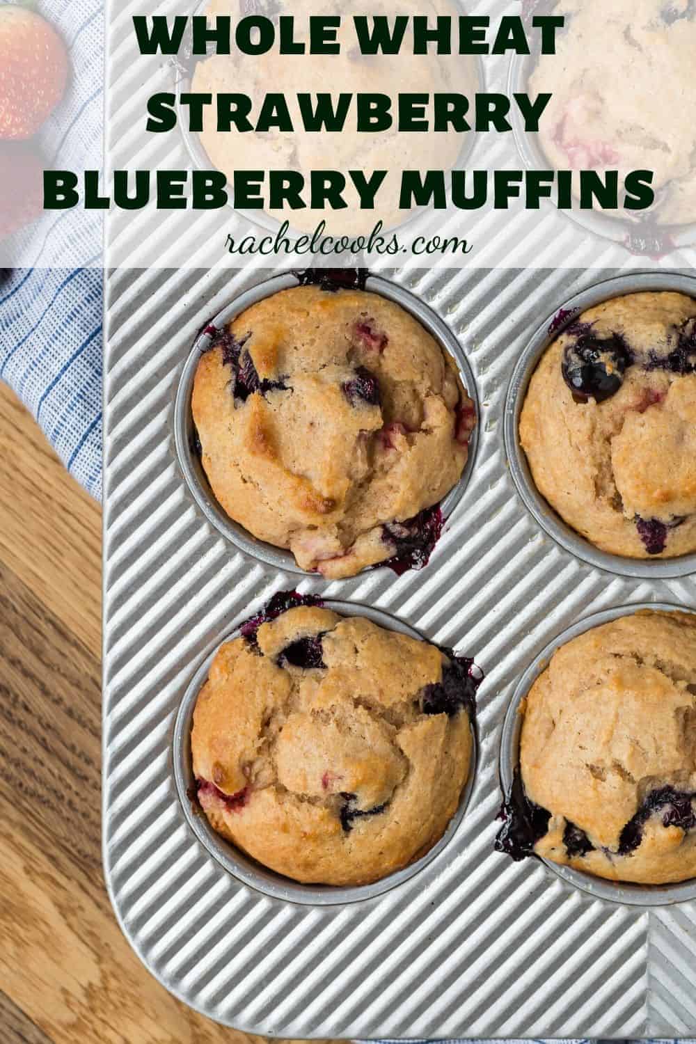 Overhead image of muffins in a tin with a text overlay that reads "strawberry blueberry muffins"