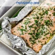 Salmon in a foil wrap, with a text overlay that reads "easy grilled salmon with garlic butter."