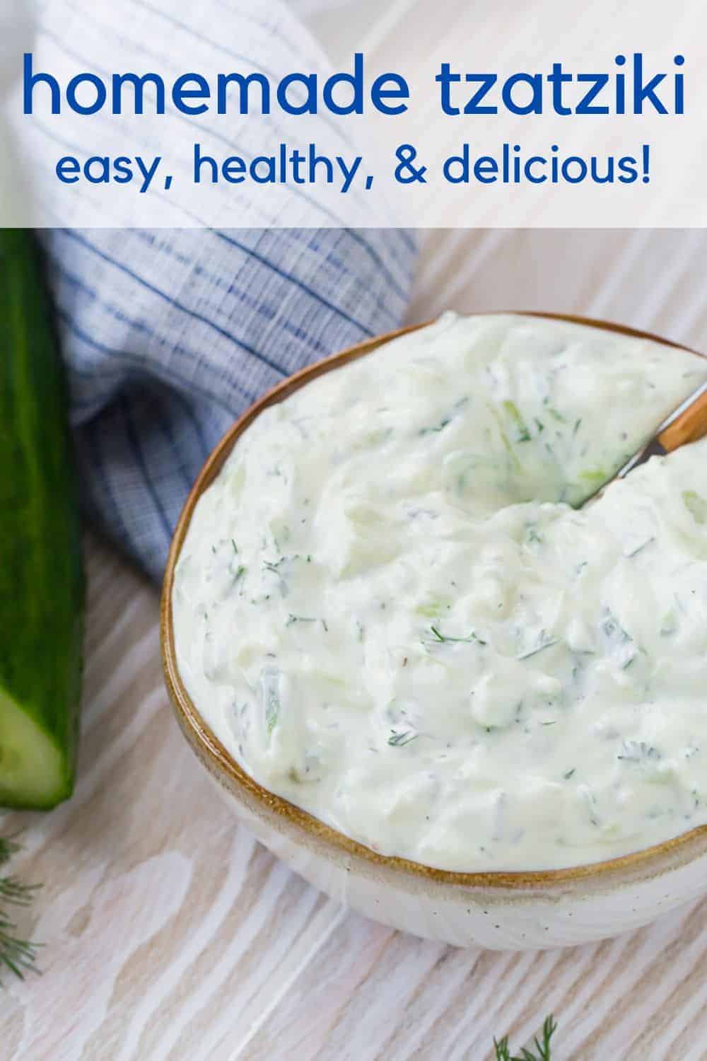 A bowl of creamy yogurt sauce with a spoon inserted, with a overlay that reads "homemade tzatziki, easy, healthy & delicious!"
