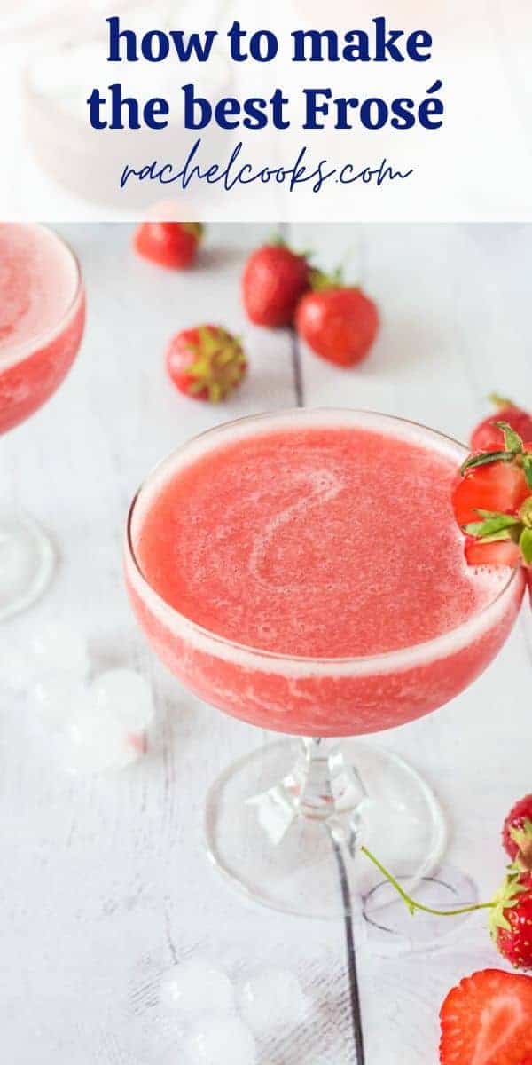 Frozen Rose wine in a stemmed glass garnished with strawberries.