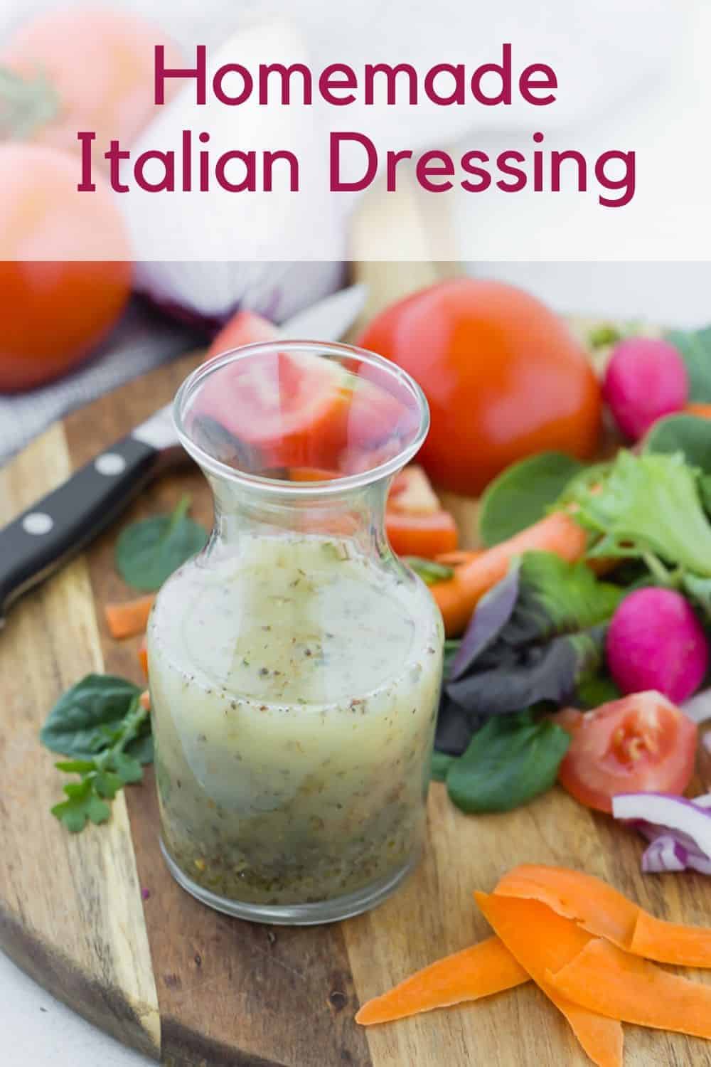 Dressing in a small glass carafe, text overlay reads "Homemade Italian Dressing"