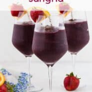 Three glasses of a dark red frozen beverage. Text overlay reads "frozen sangria."