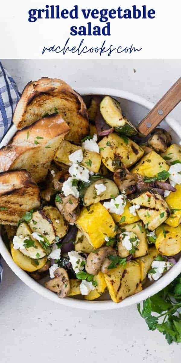 Overhead view of a warm vegetable salad, text overlay rads "grilled vegetable salad with goat cheese."