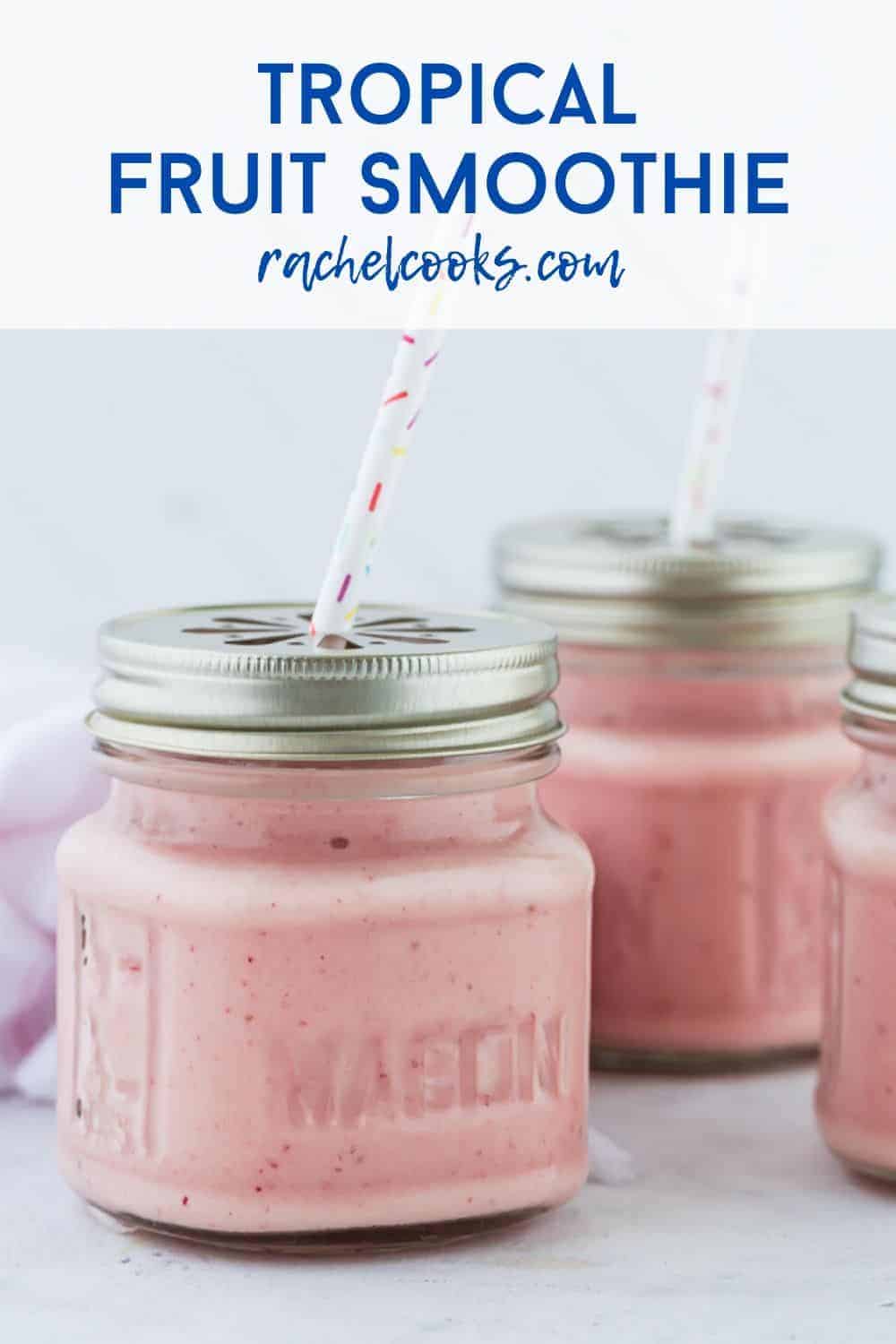 Pink fruit smoothies in small glass jars with a text overlay that reads "tropical fruit smoothie - make it your own!"