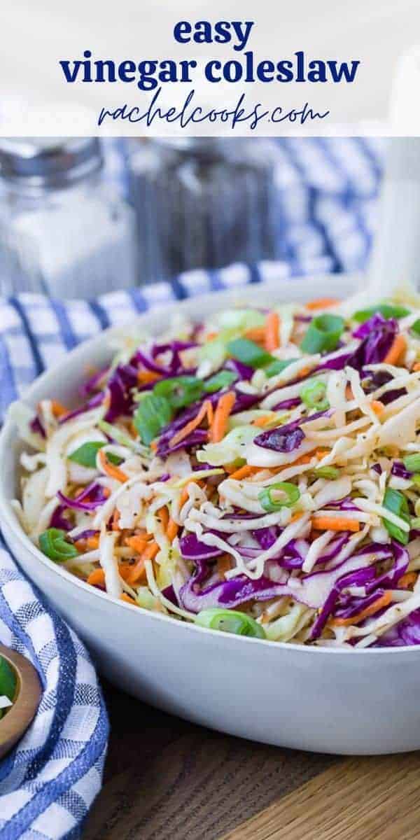 Colorful coleslaw in a white bowl with a blue and white linen.
