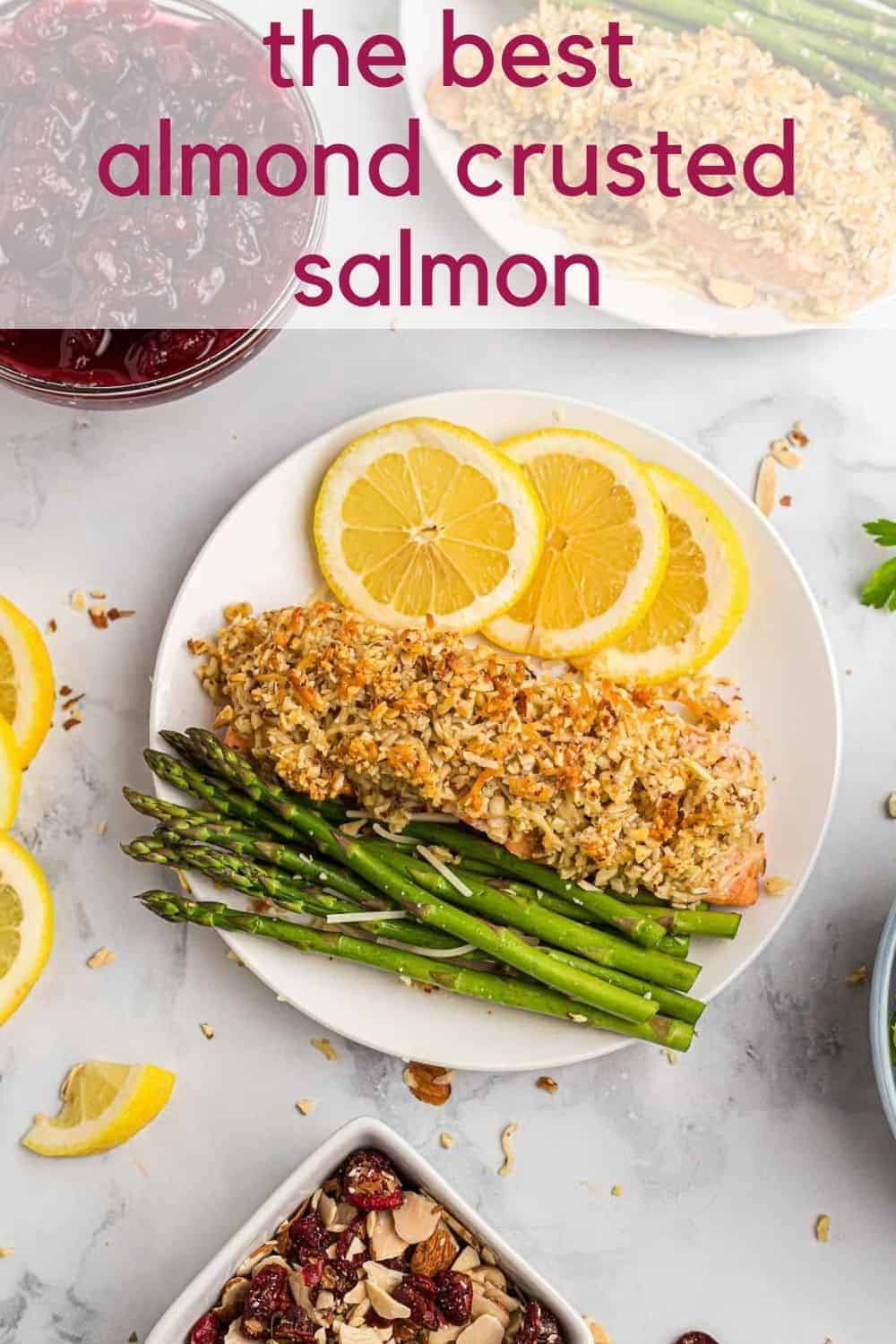Overhead view of a salmon dinner, text overlay reads "the best almond crusted salmon"