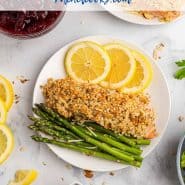 Overhead view of a salmon dinner, text overlay reads "almond crusted salmon - rachelcooks.com"