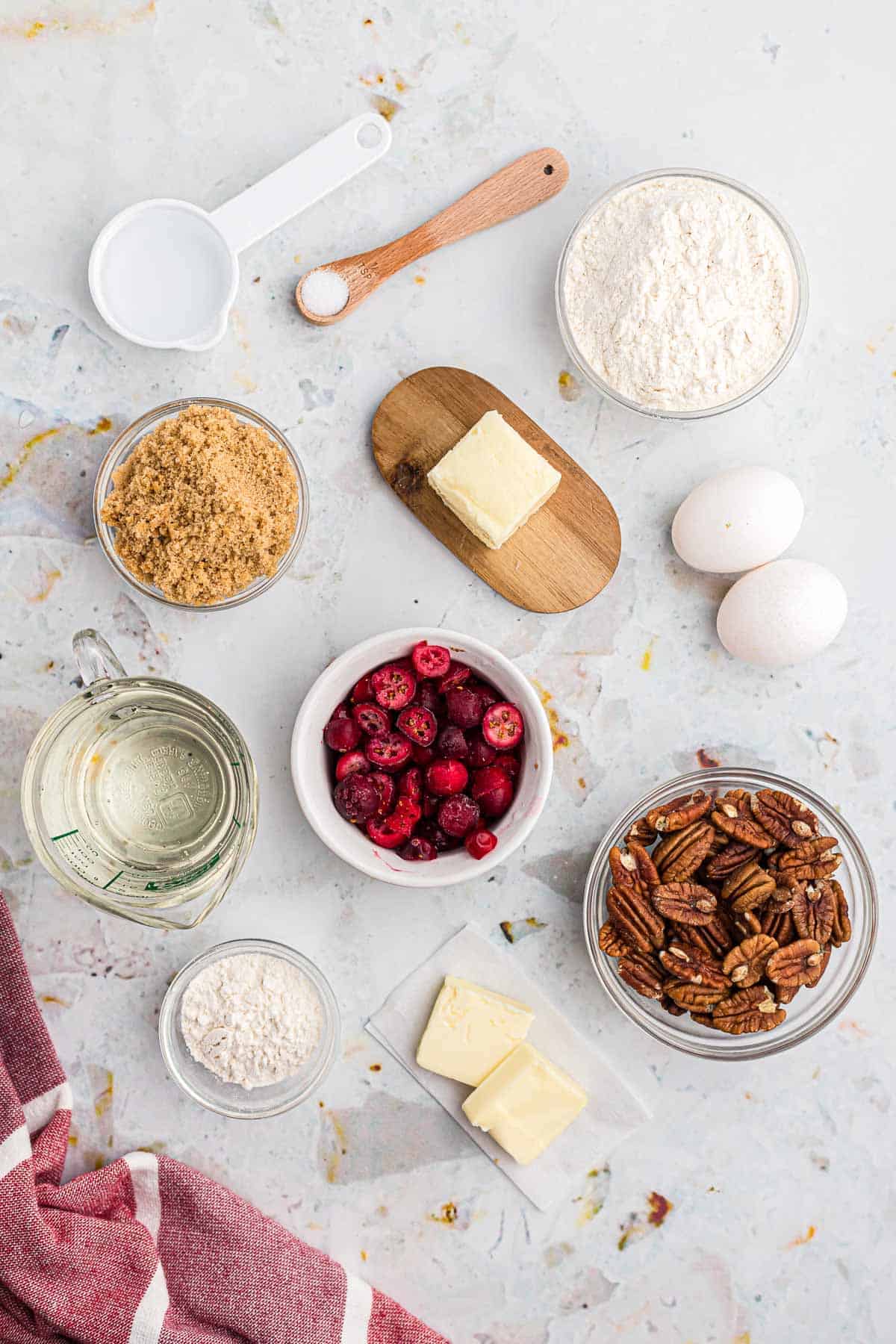 Ingredients for pecan cranberry pie, overhead view.