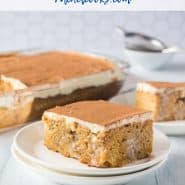 Cake on a plate, with additional cake in the background. Text overlay reads "the best pumpkin poke cake - rachelcooks.com"