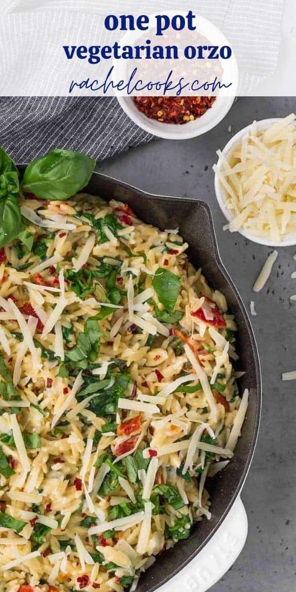 Overhead image of creamy one pot orzo with spinach, sun-dried tomatoes and fresh basil. Text overlay reads "one pan orzo with sundried tomatoes"