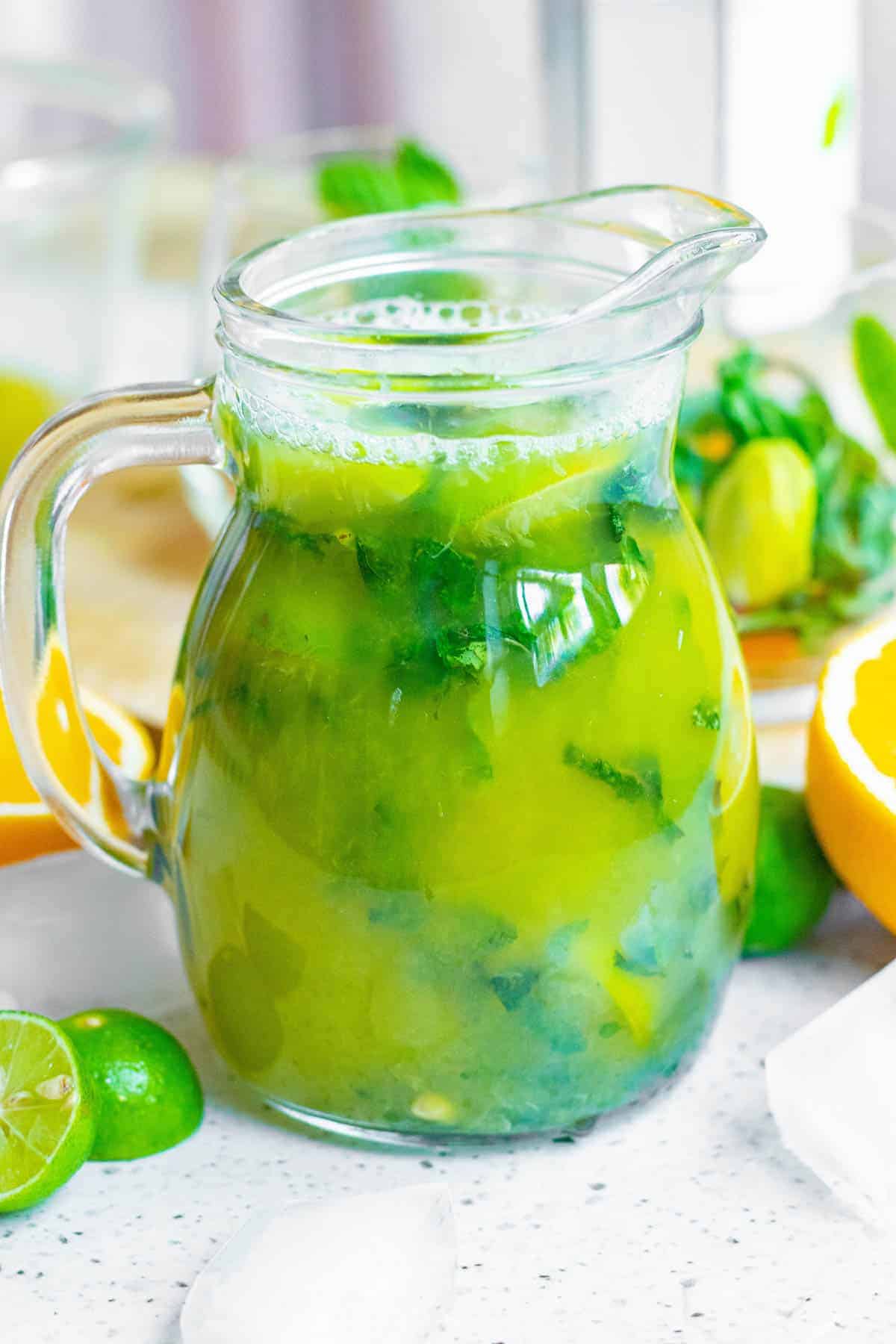 Pitcher of mint and orange mojito.