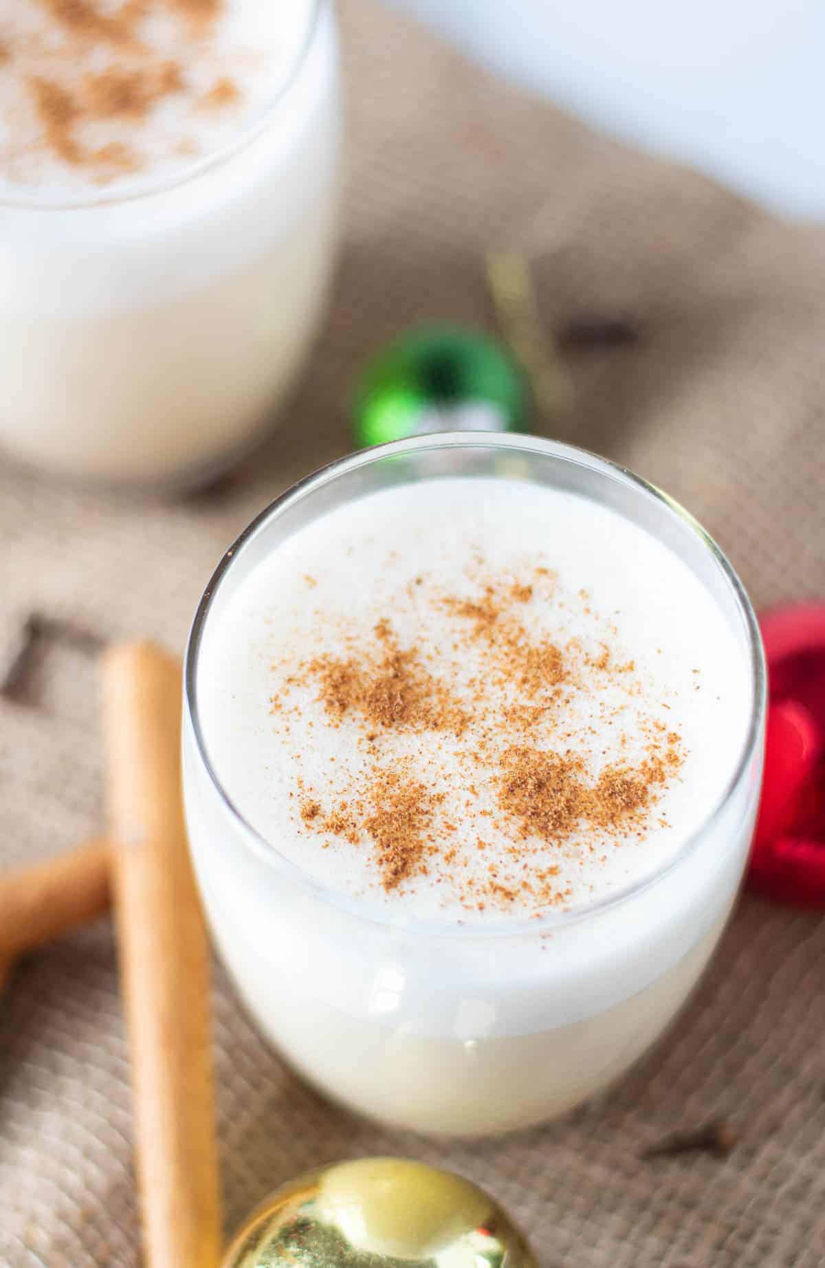 Close up of a glass of homemade eggnog.