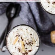 Overhead view of cocoa in two mugs. Text overlay reads "ginger spiced hot cocoa"