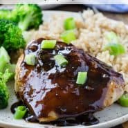 Chicken thighs with rice and broccoli and a text overlay with recipe title.