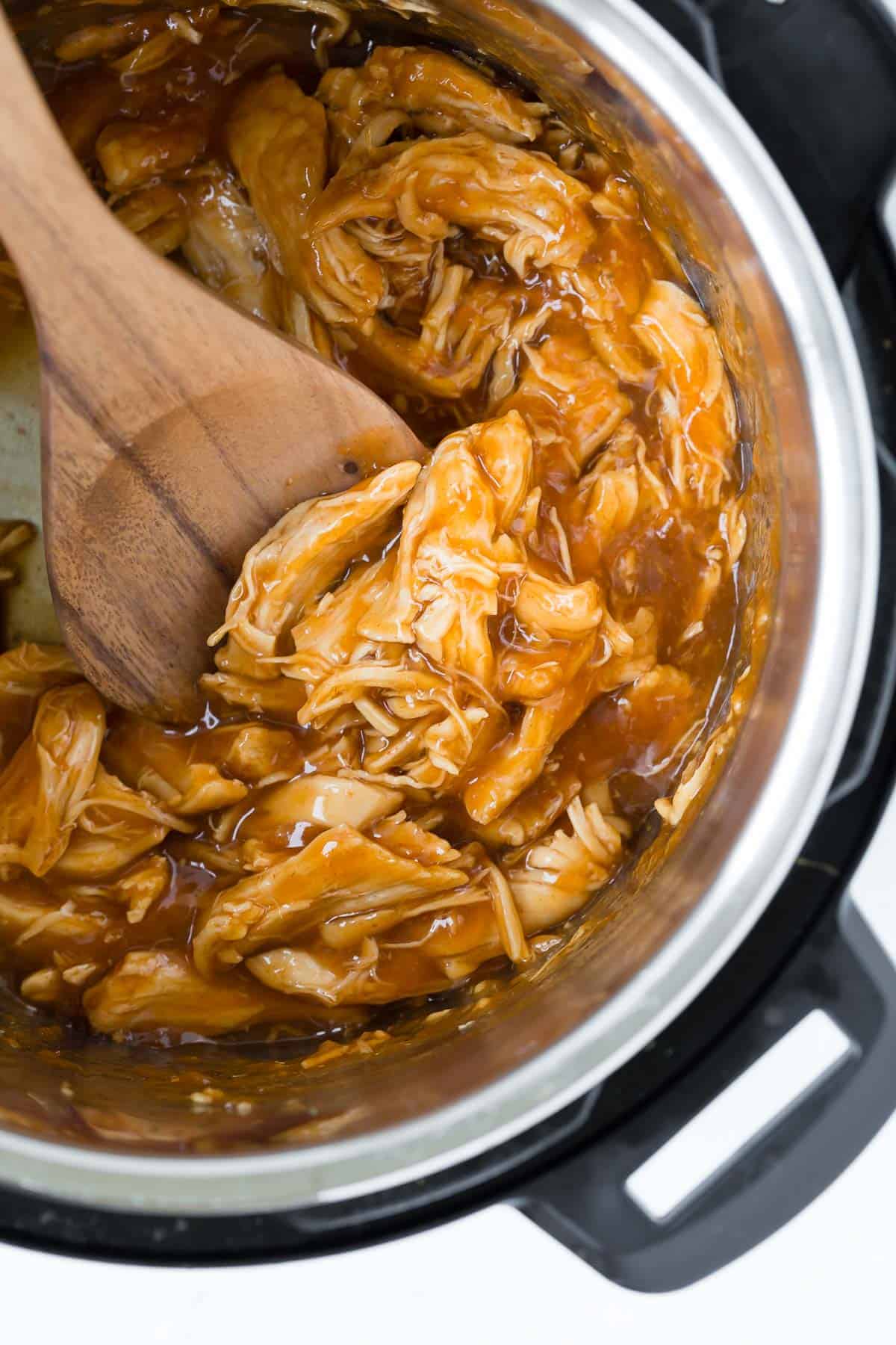 Overhead view of honey sriracha chicken in an instant pot.