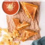 Overhead view of lunch with grilled cheese. Text overlay reads "air fryer grilled cheese with three unique recipes)