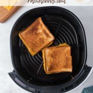 Two grilled cheese sandwiches in an air fryer basket. Text overlay reads "air fryer grilled cheese, and recipe ideas!"