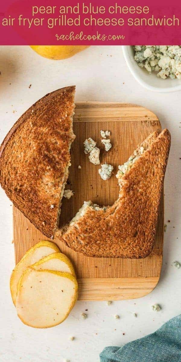 Pear and blue cheese grilled cheese sandwich with a bite taken out.