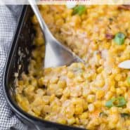 Creamy cheesy corn in a black casserole dish with a text overlay containing the recipe title.