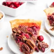 Pie slice on a white plate, text overlay reads "pecan cranberry pie, rachelcooks.com"