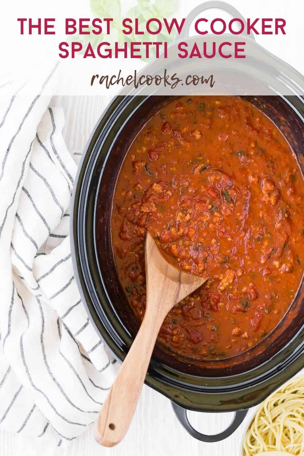 Crockpot full of spaghetti sauce, text overlay reads "the best slow cooker spaghetti sauce"