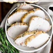 Sliced turkey, with a text overlay that reads "instant pot turkey breast - from frozen!"