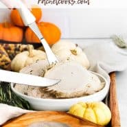 Sliced cooked turkey breast with a text overlay that reads "easy instant pot turkey breast"