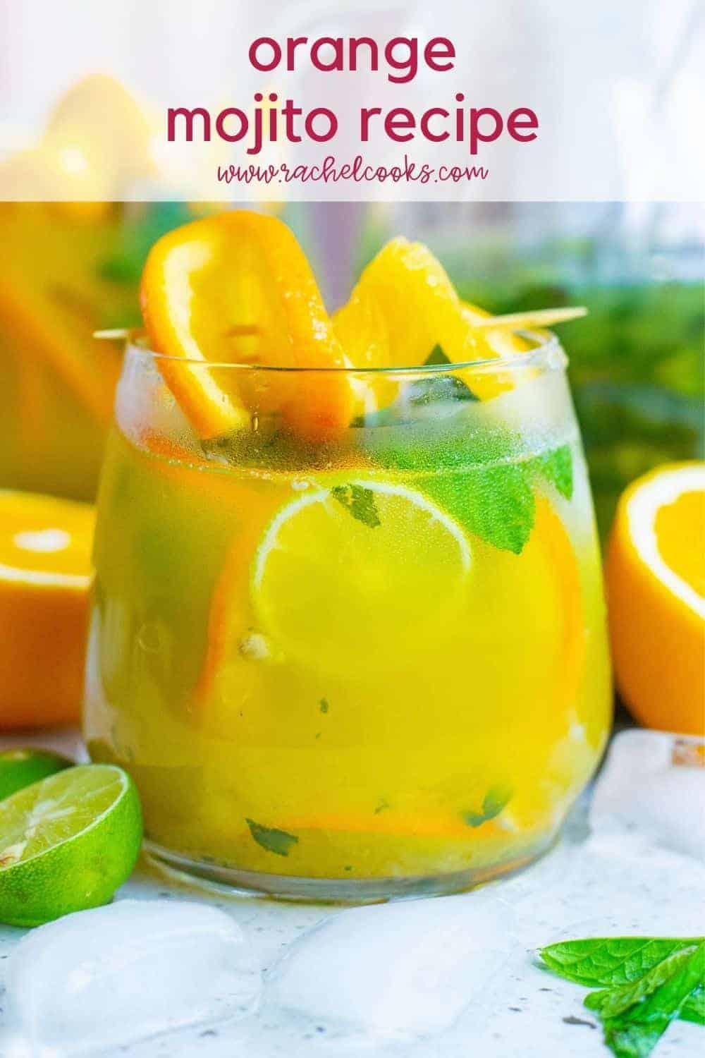 Bright orange cocktail with mint leaves, text overlay reads "orange mojito recipe, rachelcooks.com"