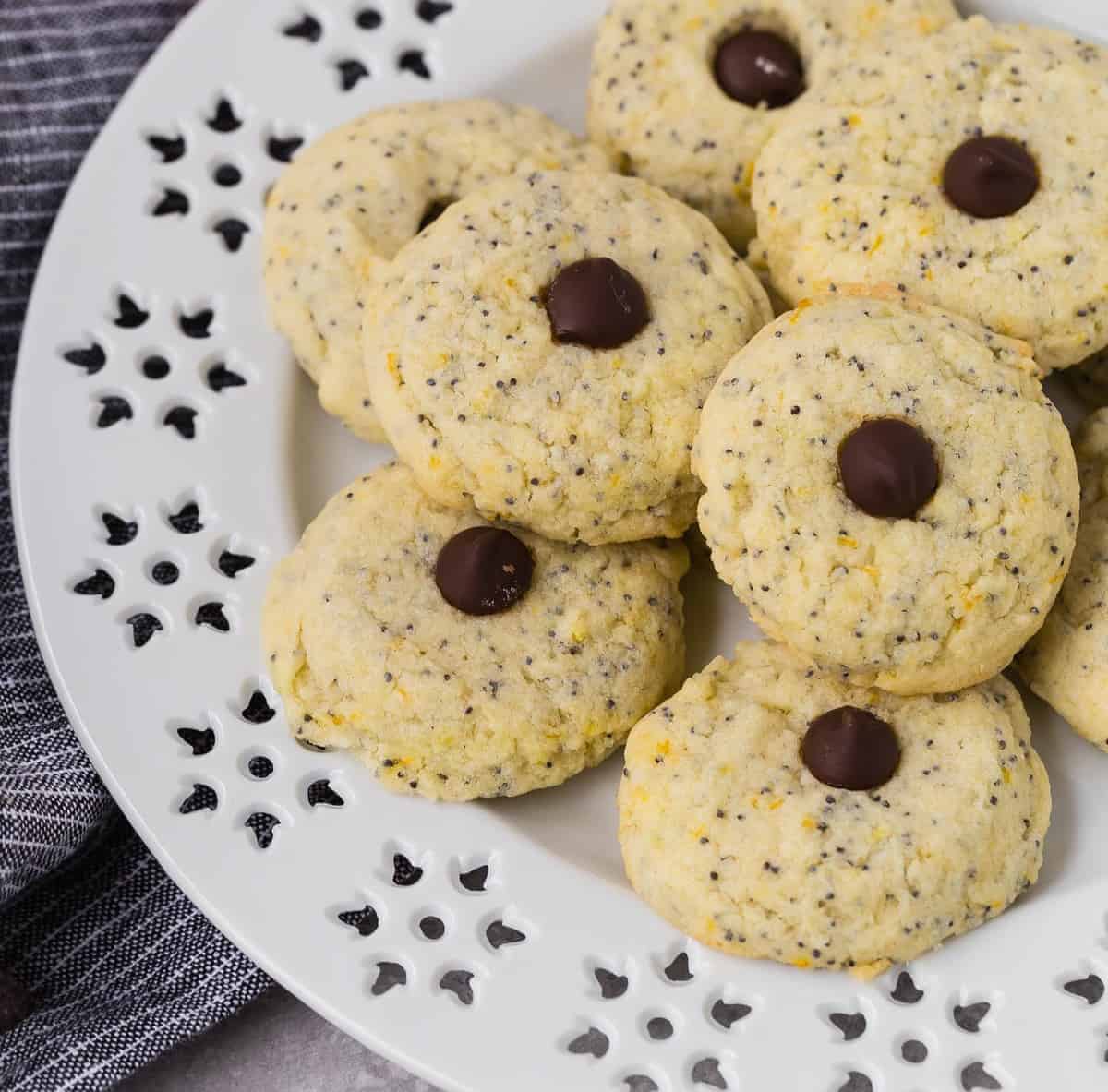 Cookies on a decorative white plate.