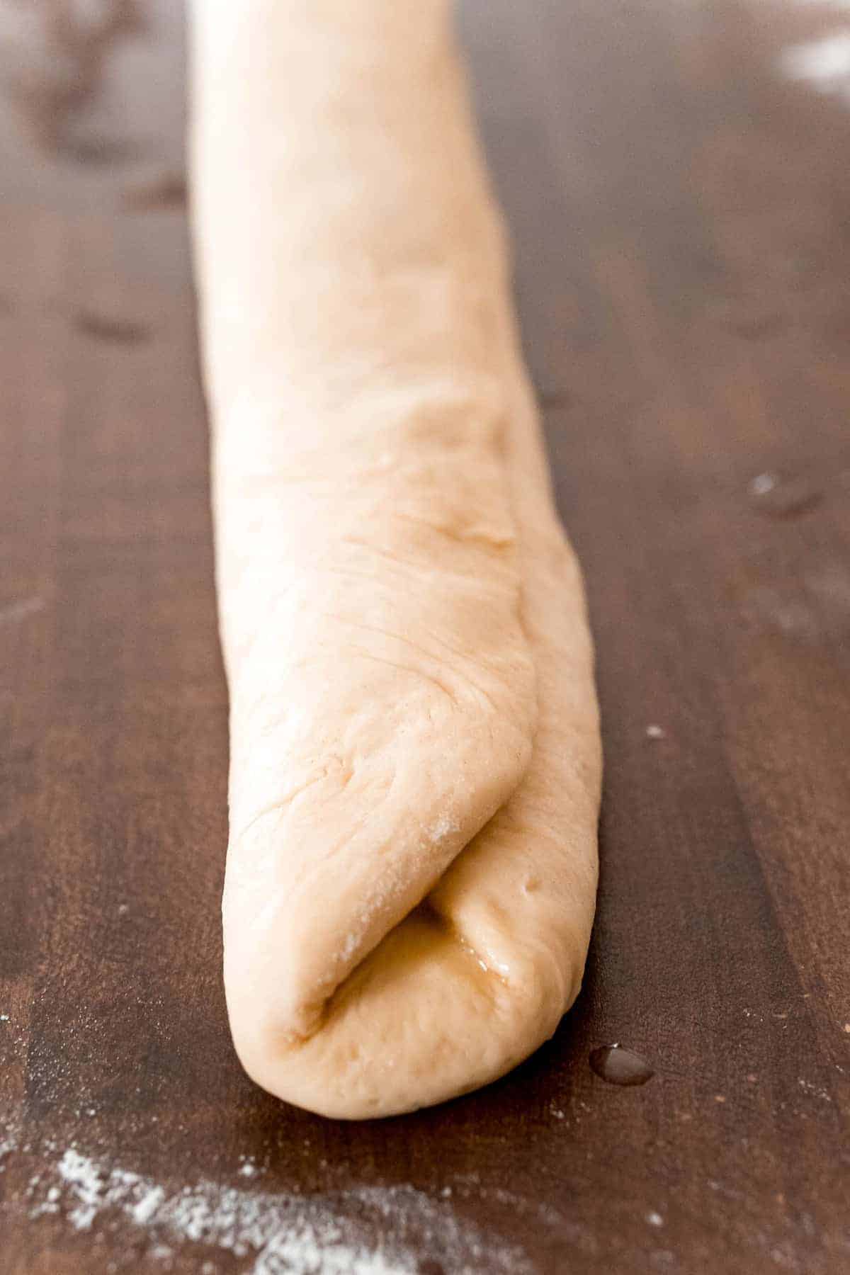 Folded dough for parker house rolls.