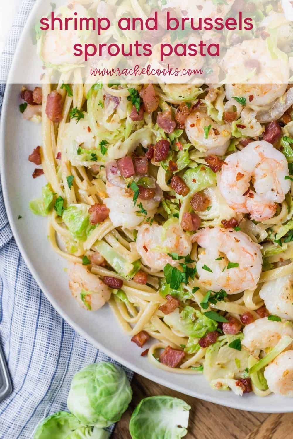 Overhead view of a plate of pasta, text overlay reads "pasta with shrimp and brussels sprouts"