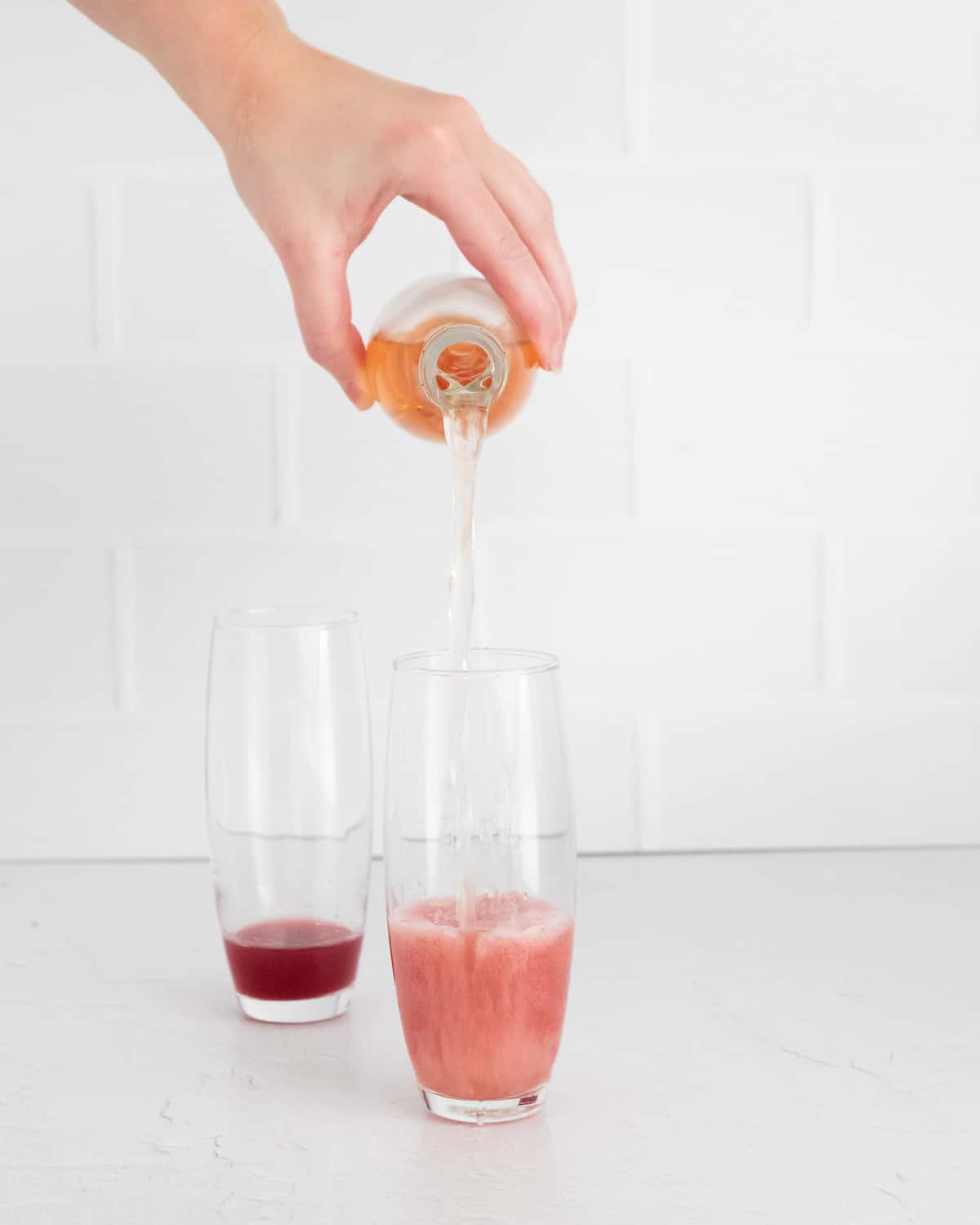 Rose being poured into a glass.