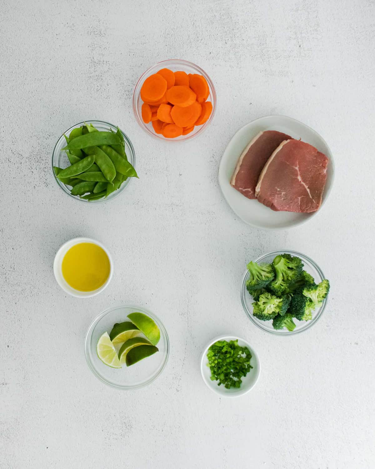 Overhead view of individual ingredients in bowls.