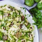 Close up of brussels sprouts salad with grapes.