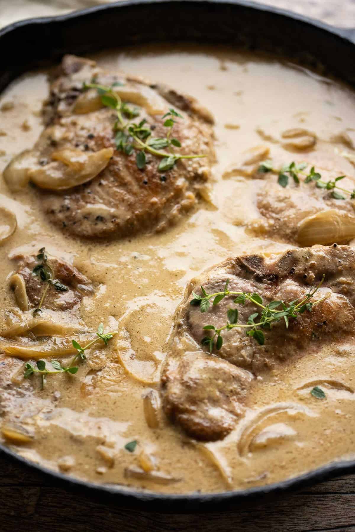 Pork chops in creamy gravy.