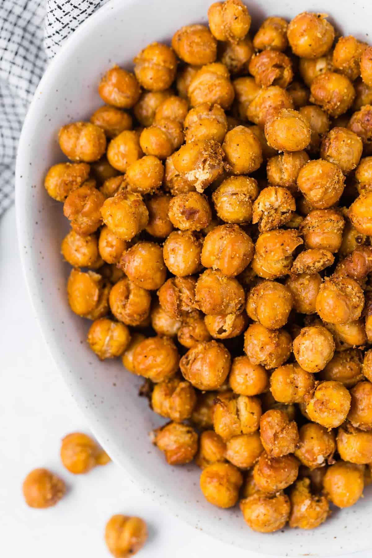 Crispy chickpeas in a white bowl, overhead view.